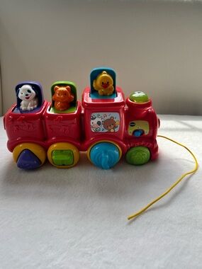 VTech Pop Up & Sing Pull Along Train Red Animal Musical Toy